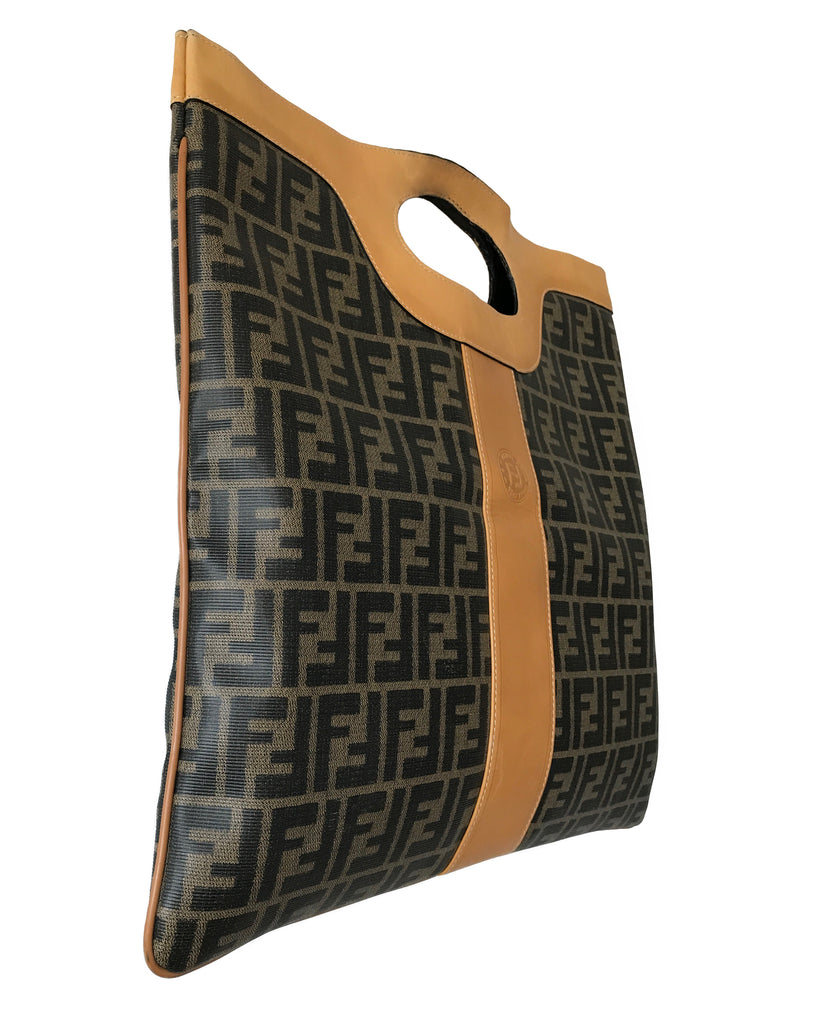 Fruit Vintage Fendi fold over convertible clutch tote bag in the iconic Fendi Zucca monogram canvas with Fendi Logo stamp.