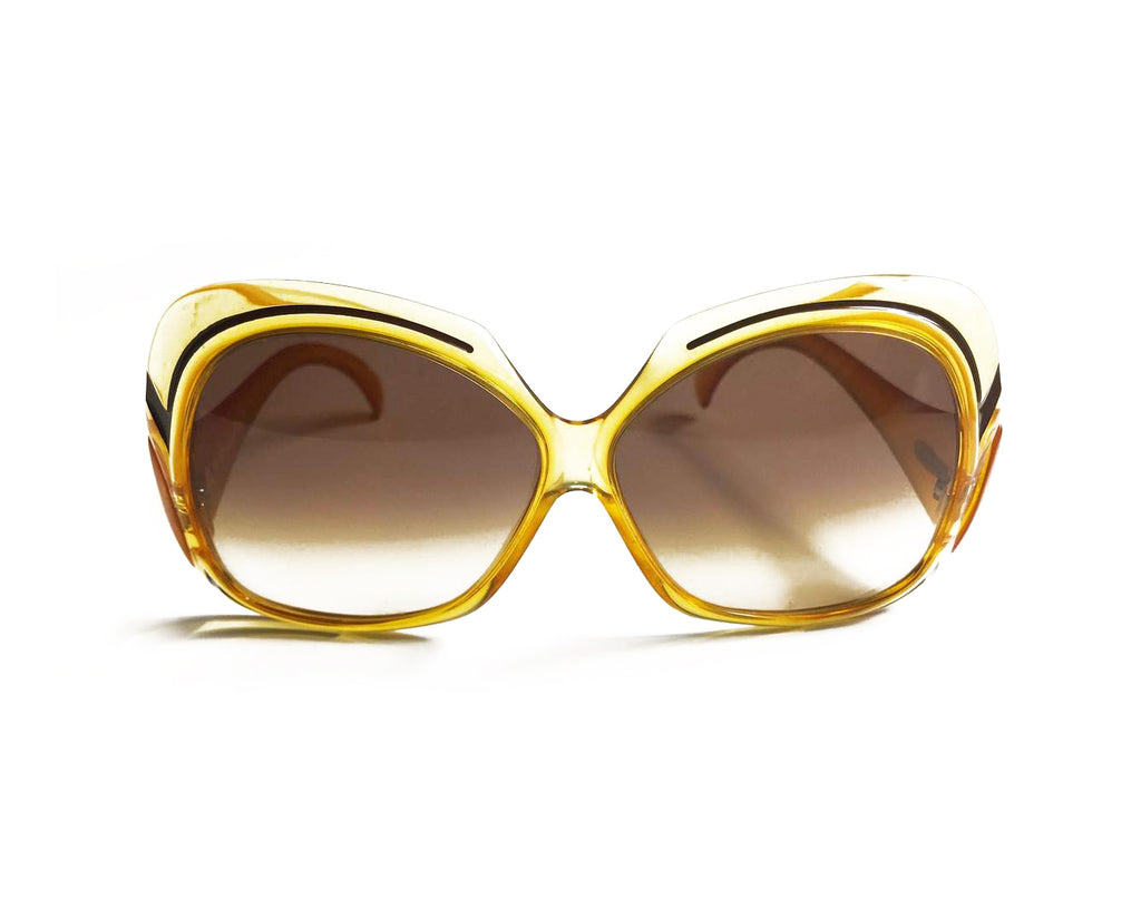 Fruit Vintage Christian Dior yellow 1970s oversize logo sunglasses in excellent condition. They feature Dior CD logos on each arm and brown gradient lenses.