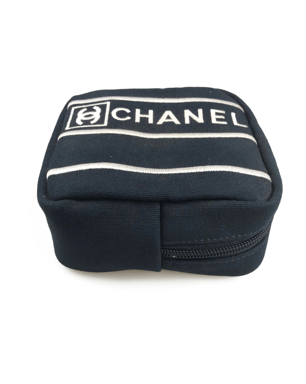 Fruit Vintage Chanel tennis ball set - a rare and important Chanel collectors accessory. It features a 4 Chanel tennis balls (2 pink and 2 blue) in a navy zipper accessory pouch with logo embroidery.