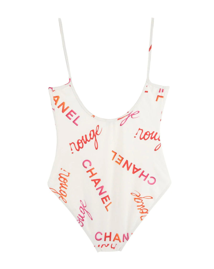 FRUIT Vintage rare Chanel Rouge 1996 Logo text off white one piece swimsuit bodysuit by Karl Lagerfeld. Features a large pink text print and a classic flattering cut with low back.