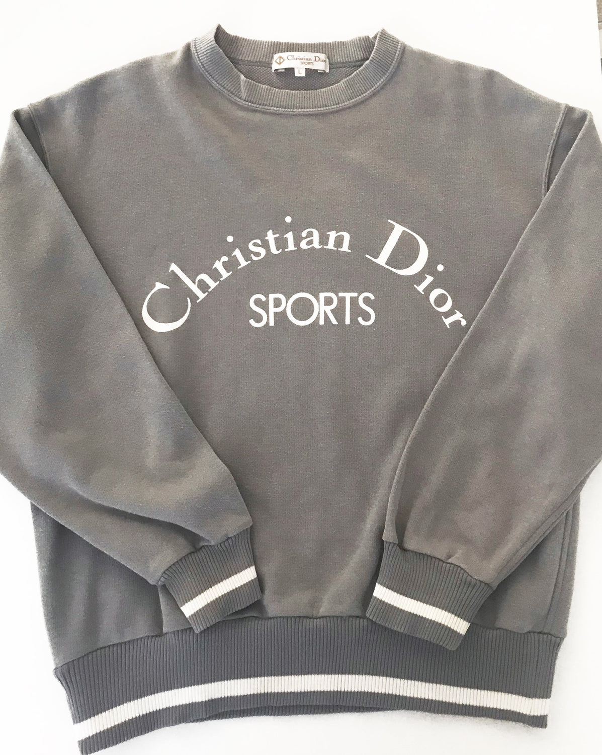 Fruit Vintage Christian Dior Sport Grey 1980s Logo sweat shirt. It features a large printed logo design at front and classic sweat shirt cut.
