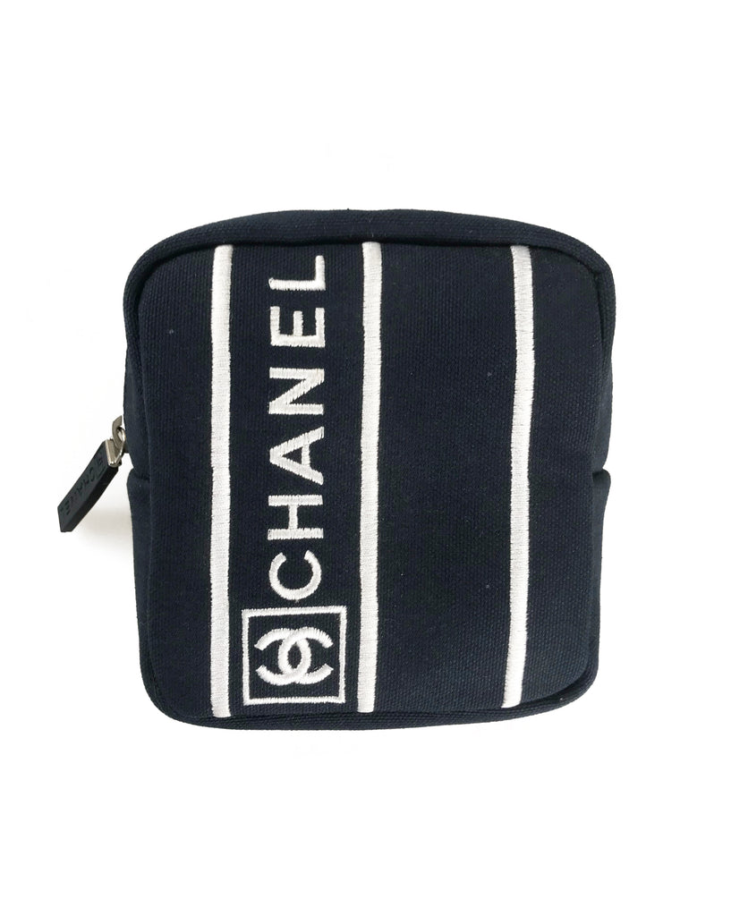 Fruit Vintage Chanel tennis ball set - a rare and important Chanel collectors accessory. It features a 4 Chanel tennis balls (2 pink and 2 blue) in a navy zipper accessory pouch with logo embroidery.