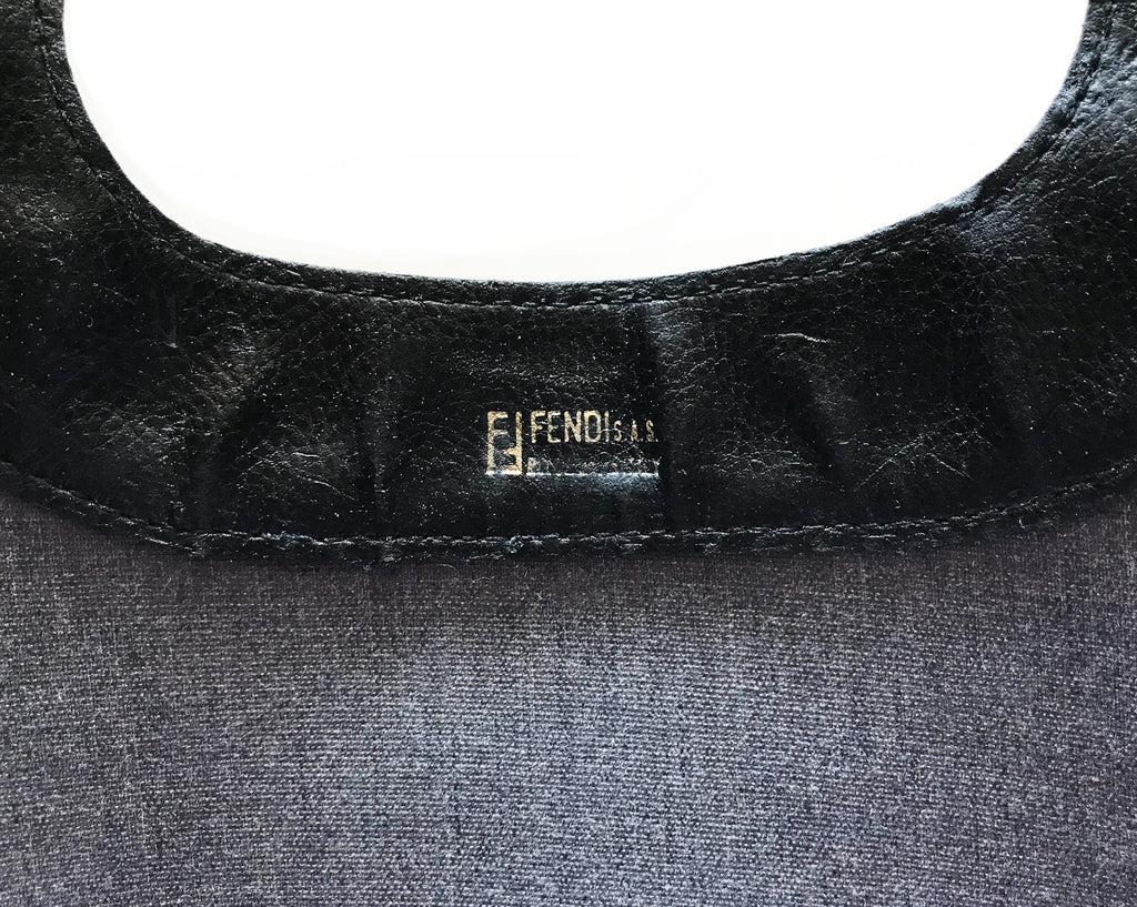 Fruit Vintage Fendi fold over convertible clutch tote bag in the iconic Fendi Zucca monogram canvas with Fendi Logo stamp.