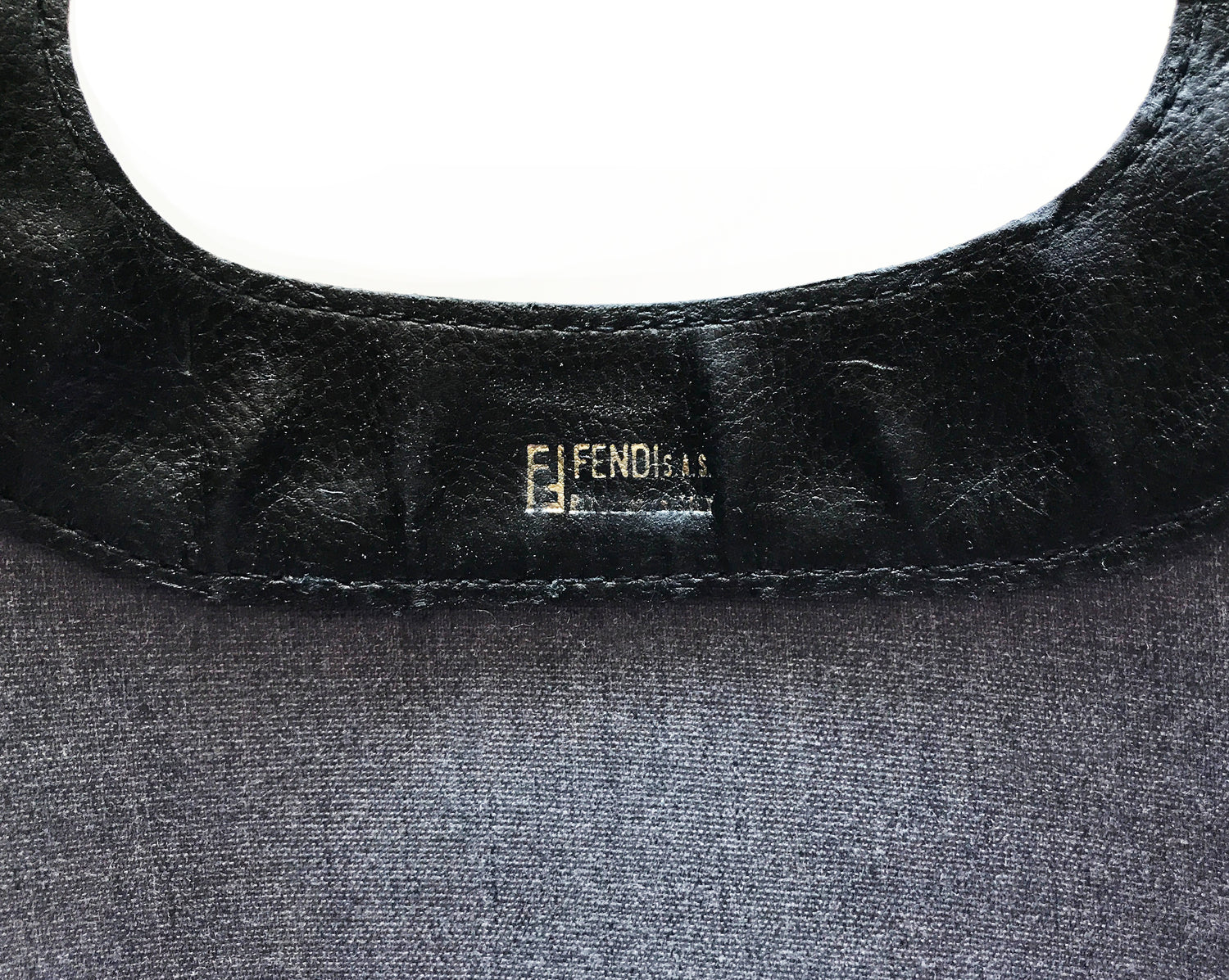 Fruit Vintage Fendi fold over convertible clutch tote bag in the iconic Fendi Zucca monogram canvas with Fendi Logo stamp.