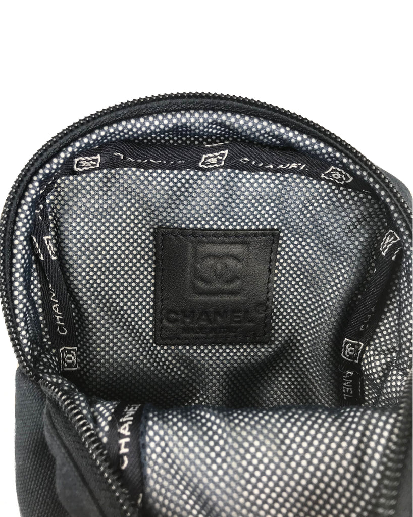 Fruit Vintage Chanel tennis ball set - a rare and important Chanel collectors accessory. It features a 4 Chanel tennis balls (2 pink and 2 blue) in a navy zipper accessory pouch with logo embroidery.