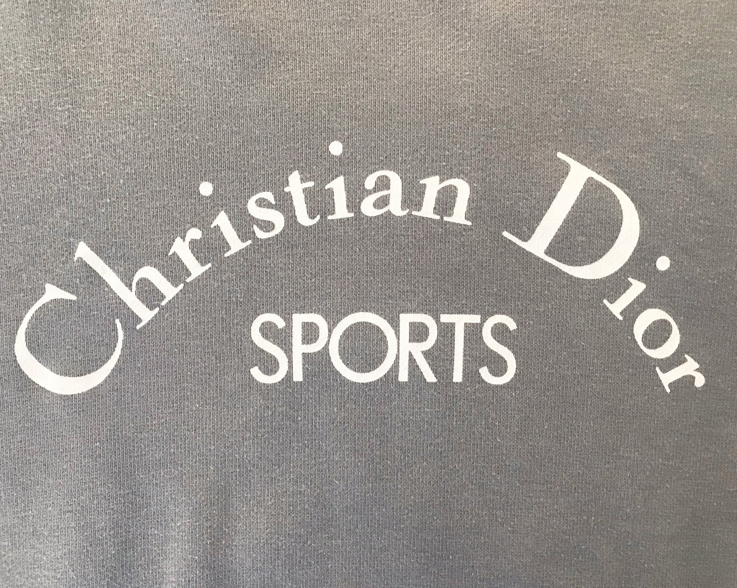 Fruit Vintage Christian Dior Sport Grey 1980s Logo sweat shirt. It features a large printed logo design at front and classic sweat shirt cut.