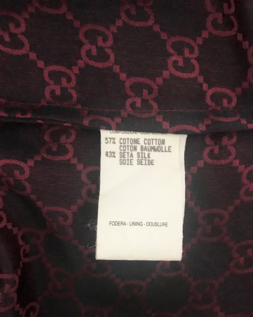 FRUIT vintage Gucci silk shirt designed by Tom Ford dating to the late 1990s. It features a classic Gucci monogram logo print all over in red/black contrast print and a tailored fitted shape.