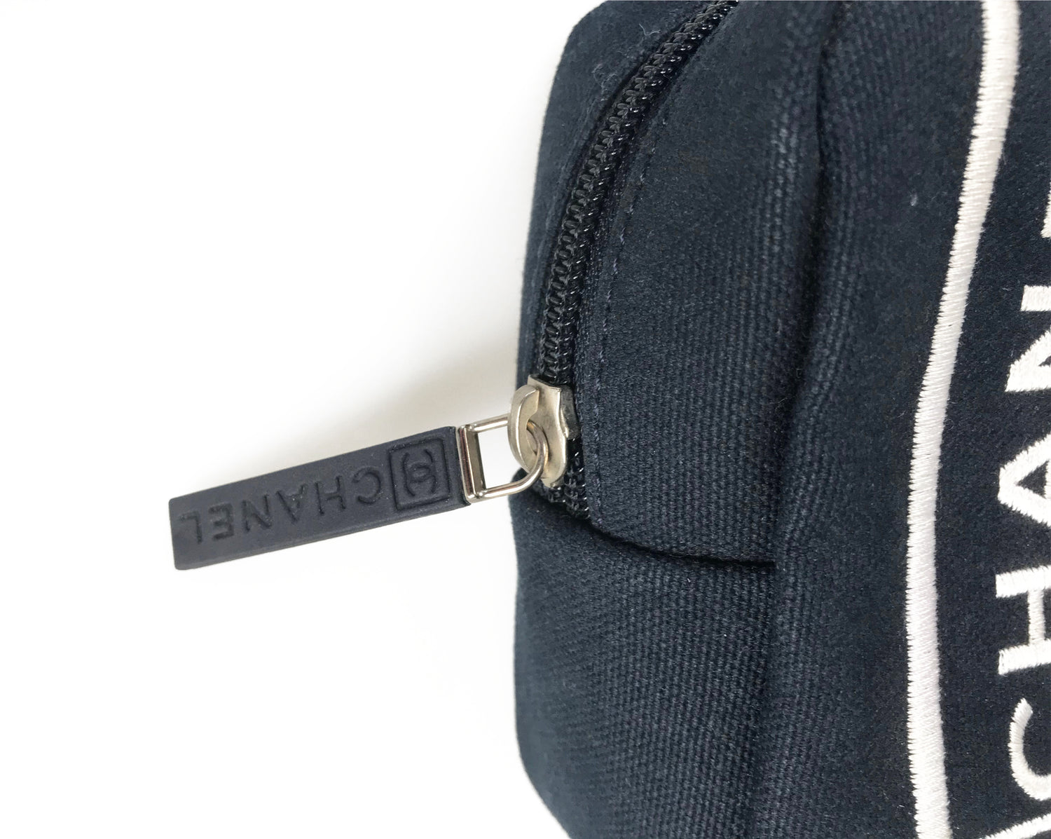 Fruit Vintage Chanel tennis ball set - a rare and important Chanel collectors accessory. It features a 4 Chanel tennis balls (2 pink and 2 blue) in a navy zipper accessory pouch with logo embroidery.