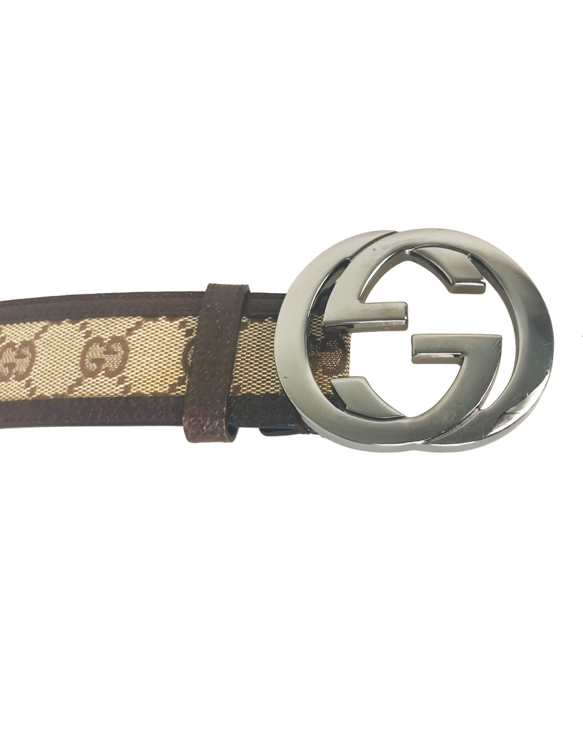 Fruit Vintage Gucci logo belt with gucci monogram canvas inset and brown contrast leather trim and lining and a large Gucci double G buckle at front.