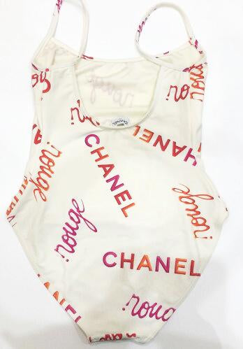 FRUIT Vintage rare Chanel Rouge 1996 Logo text off white one piece swimsuit bodysuit by Karl Lagerfeld. Features a large pink text print and a classic flattering cut with low back.