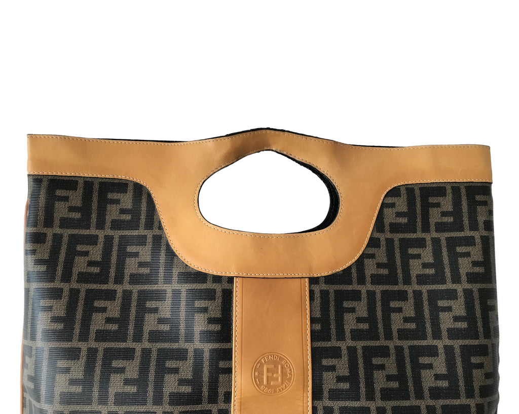 Fruit Vintage Fendi fold over convertible clutch tote bag in the iconic Fendi Zucca monogram canvas with Fendi Logo stamp.