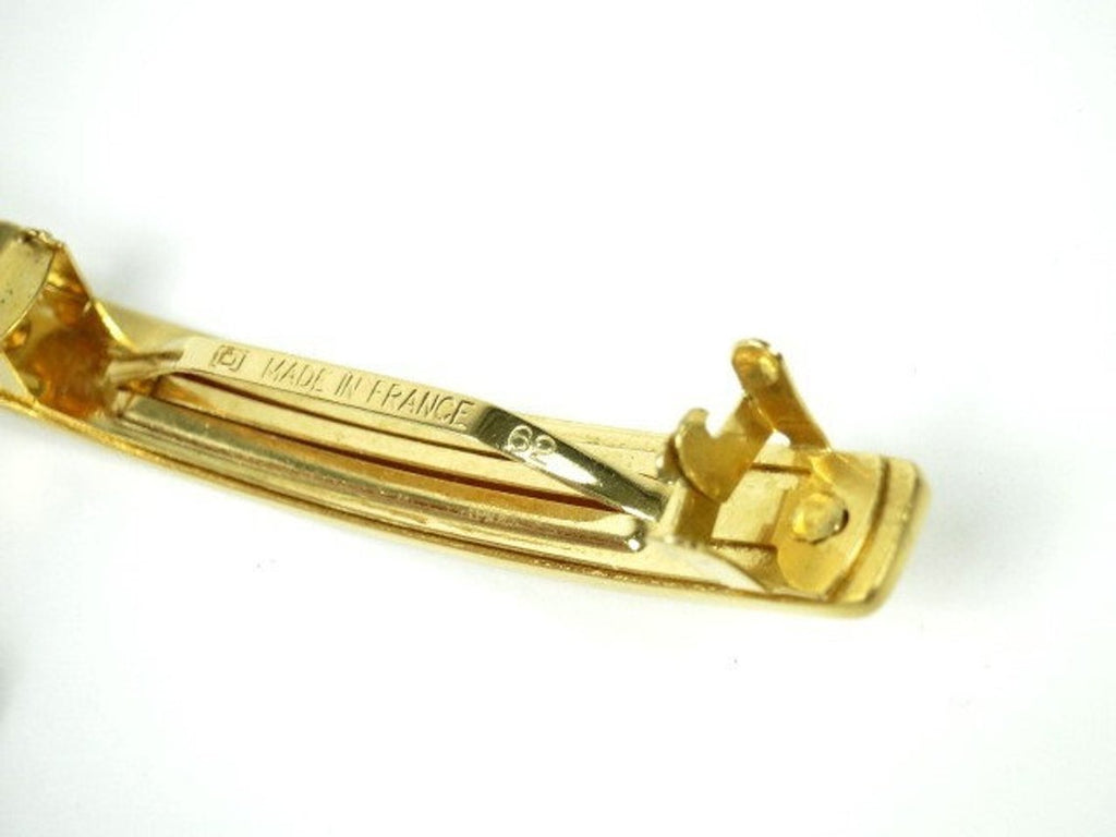 Fruit Vintage Chanel gold text logo barrette hair clip.