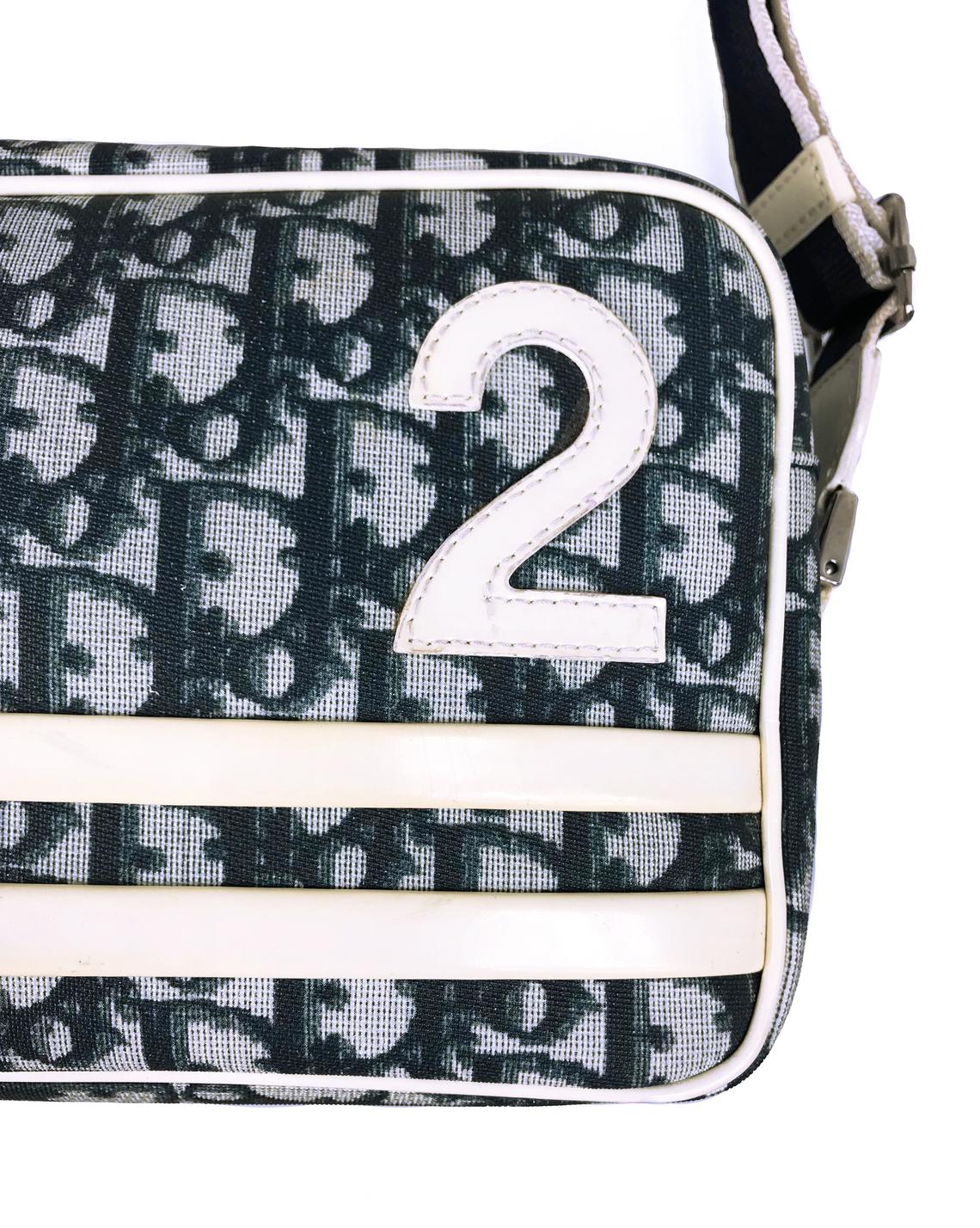 FRUIT vintage iconic Christian Dior by John Galliano navy coated monogram oblique canvas trotter bag with the famous number and racing stripe detailing at front.