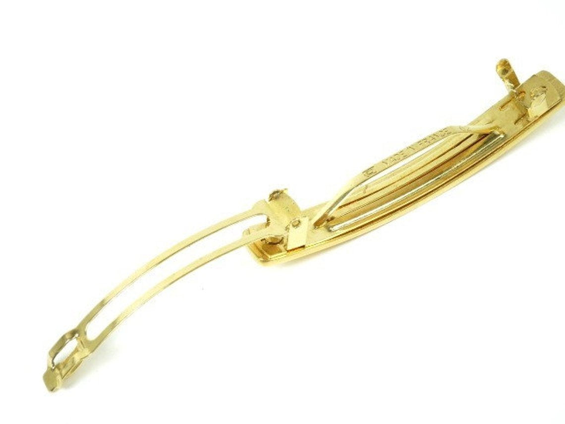 Fruit Vintage Chanel gold text logo barrette hair clip.