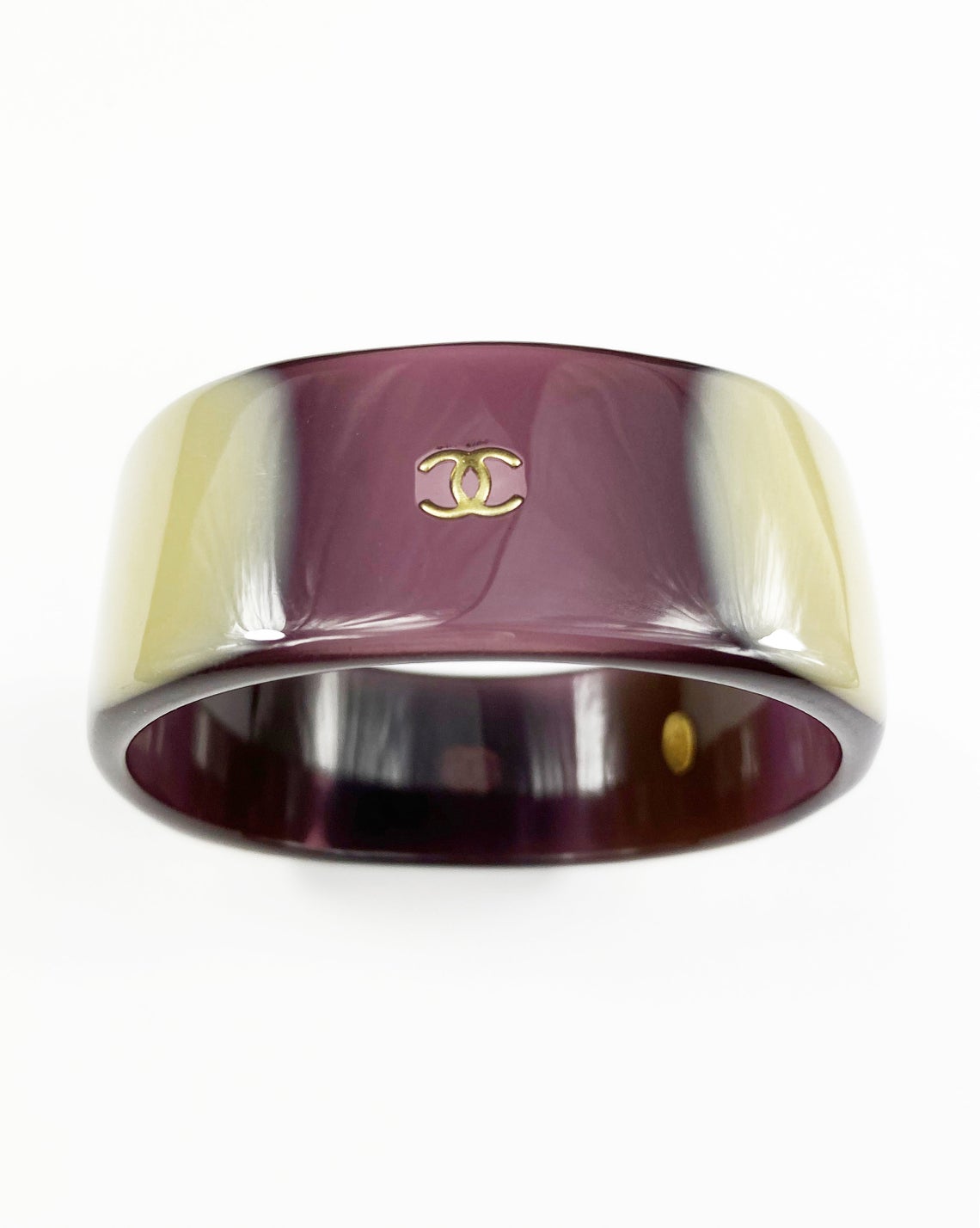 Fruit Vintage Chanel Purple and beige resin bangle. Features a classic interlocking CC logo to either side (this is a metal charm set into the resin).