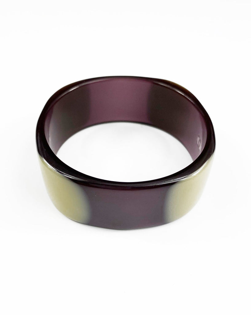 Fruit Vintage Chanel Purple and beige resin bangle. Features a classic interlocking CC logo to either side (this is a metal charm set into the resin).