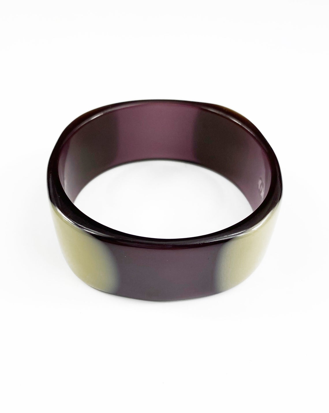 Fruit Vintage Chanel Purple and beige resin bangle. Features a classic interlocking CC logo to either side (this is a metal charm set into the resin).