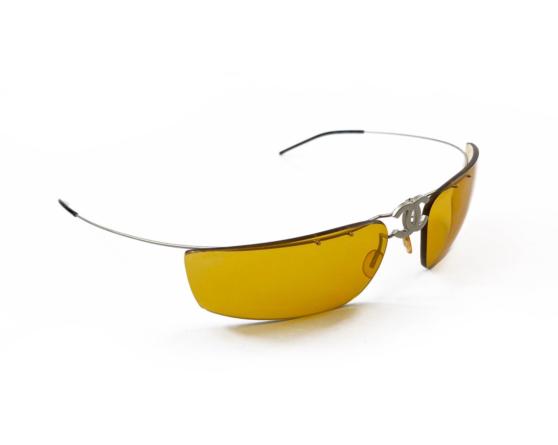 Fruit Vintage Chanel Y2K folding logo sunglasses. They feature Chanel CC logo monograms at the centre, and incredible folding body and light weight structure.