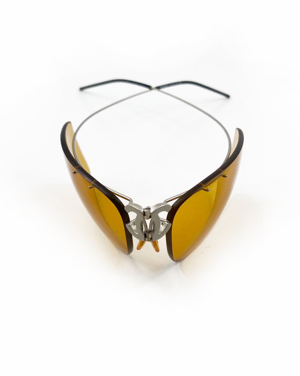 Fruit Vintage Chanel Y2K folding logo sunglasses. They feature Chanel CC logo monograms at the centre, and incredible folding body and light weight structure.