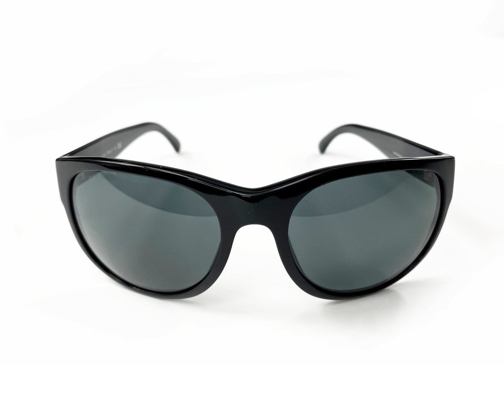 Fruit Vintage classic Chanel black logo sunglasses. They feature Chanel CC logo monograms to each side made from silver mirror.