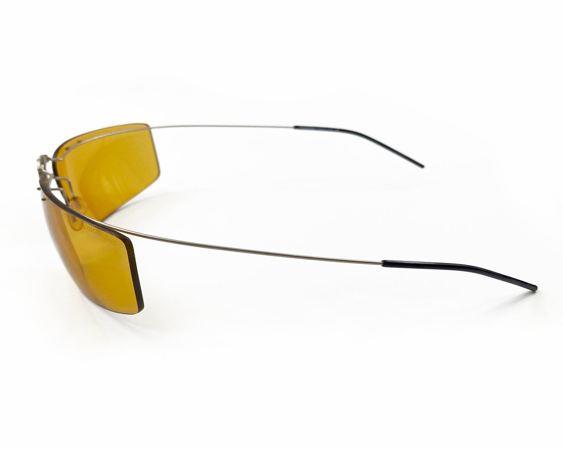Fruit Vintage Chanel Y2K folding logo sunglasses. They feature Chanel CC logo monograms at the centre, and incredible folding body and light weight structure.