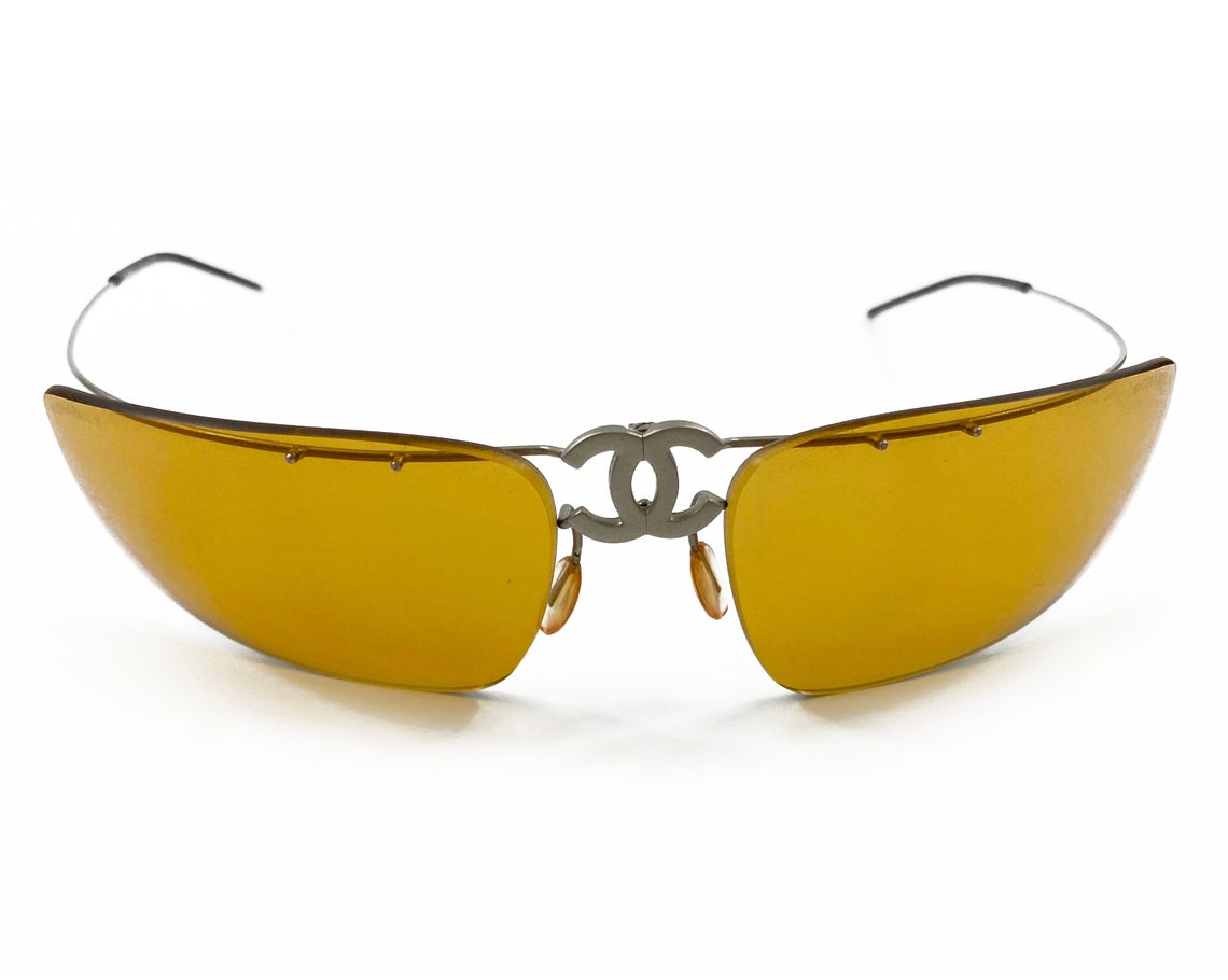 Fruit Vintage Chanel Y2K folding logo sunglasses. They feature Chanel CC logo monograms at the centre, and incredible folding body and light weight structure.