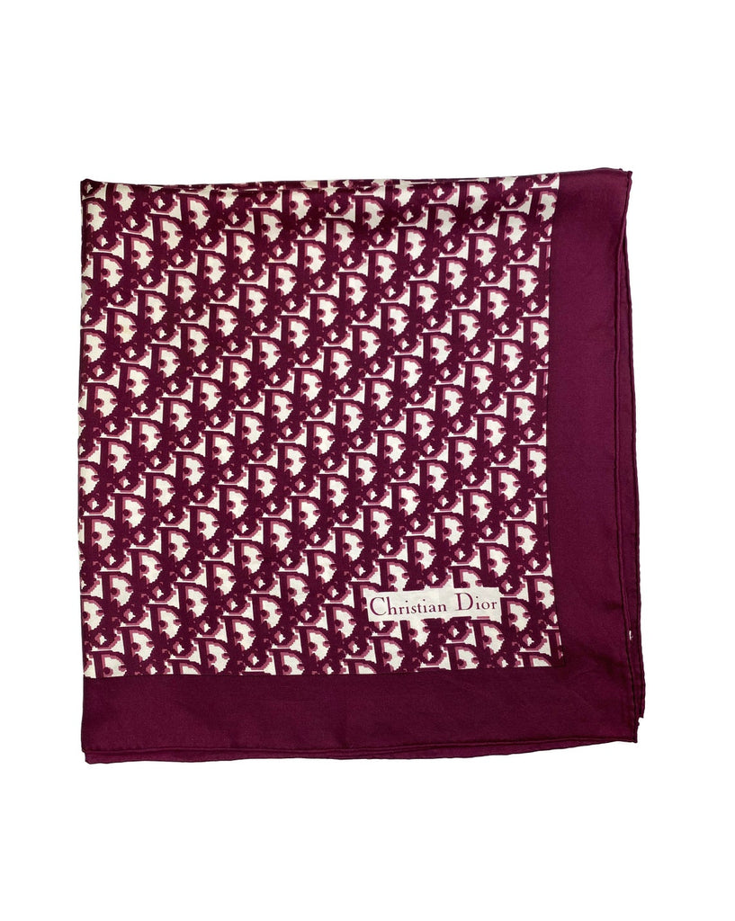 Fruit Vintage Christian Dior oblique print silk scarf in deep red/maroon. Features a bold graphic Dior logo print and hand finished rolled hem edging.