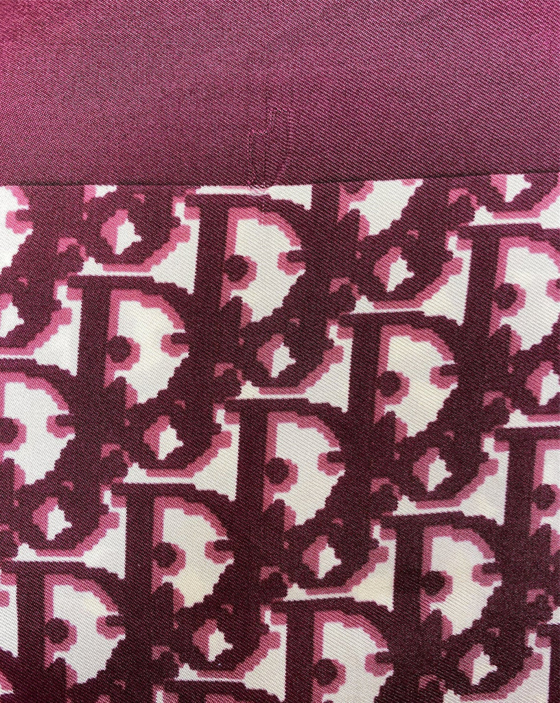 Fruit Vintage Christian Dior oblique print silk scarf in deep red/maroon. Features a bold graphic Dior logo print and hand finished rolled hem edging.