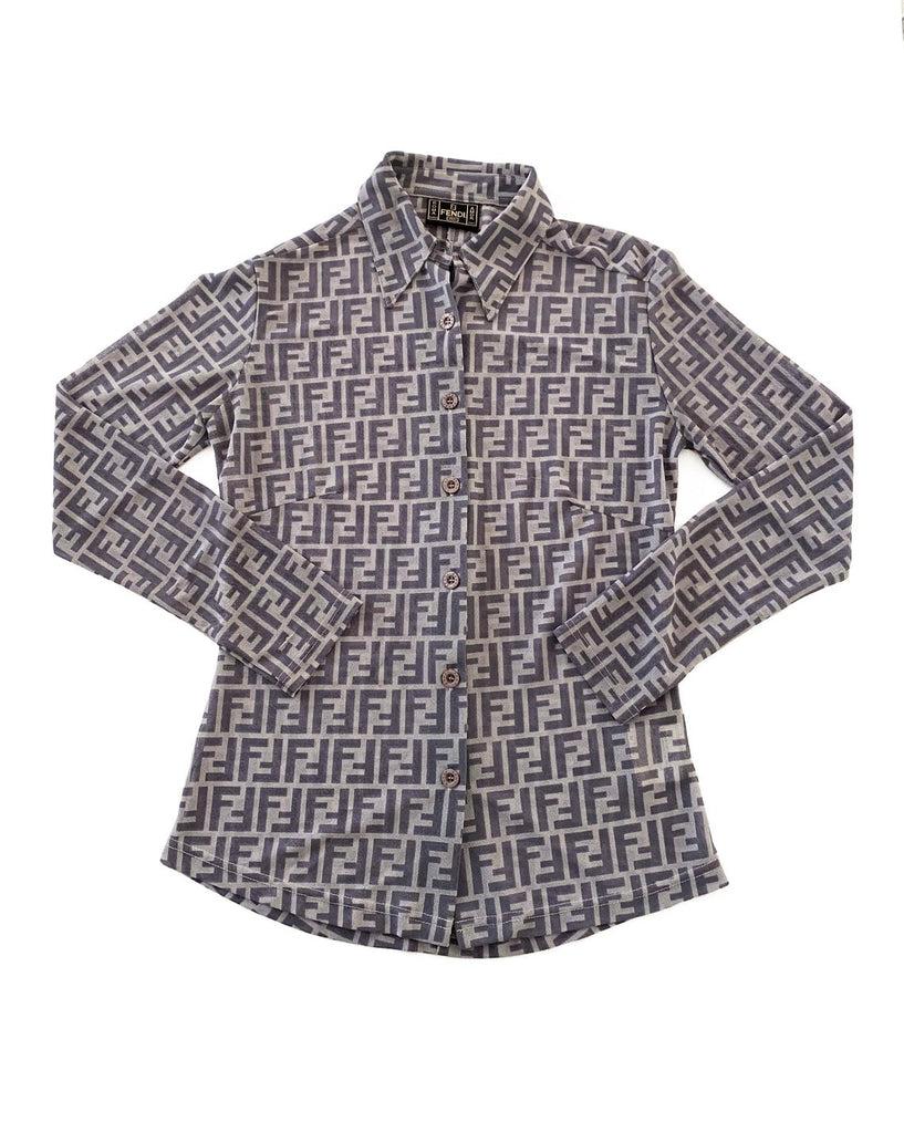 FRUIT Vintage Fendi Zucca print button up shirt dating to the early 90s. This amazing piece is made from a sheer mesh and features a bold Fendi Zucca print in two tone grey.