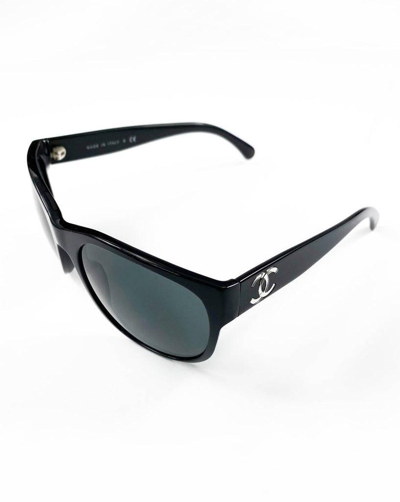 Fruit Vintage classic Chanel black logo sunglasses. They feature Chanel CC logo monograms to each side made from silver mirror.