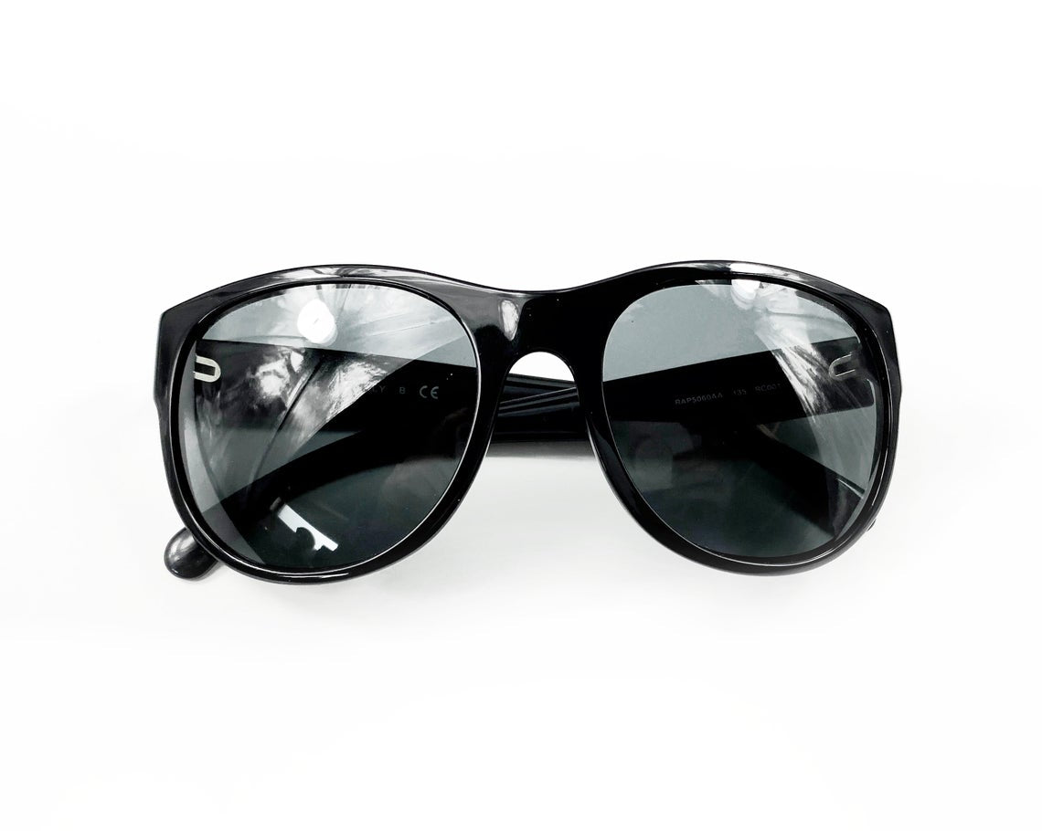 Fruit Vintage classic Chanel black logo sunglasses. They feature Chanel CC logo monograms to each side made from silver mirror.