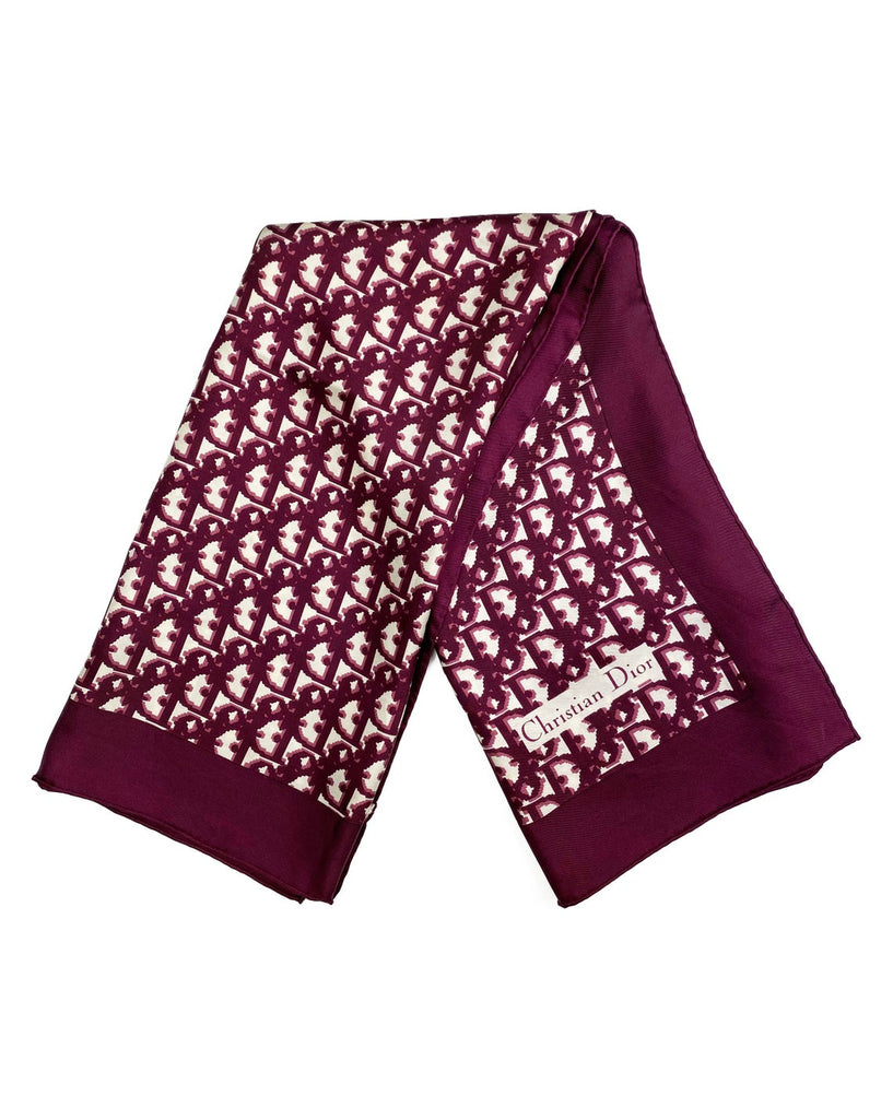 Fruit Vintage Christian Dior oblique print silk scarf in deep red/maroon. Features a bold graphic Dior logo print and hand finished rolled hem edging.