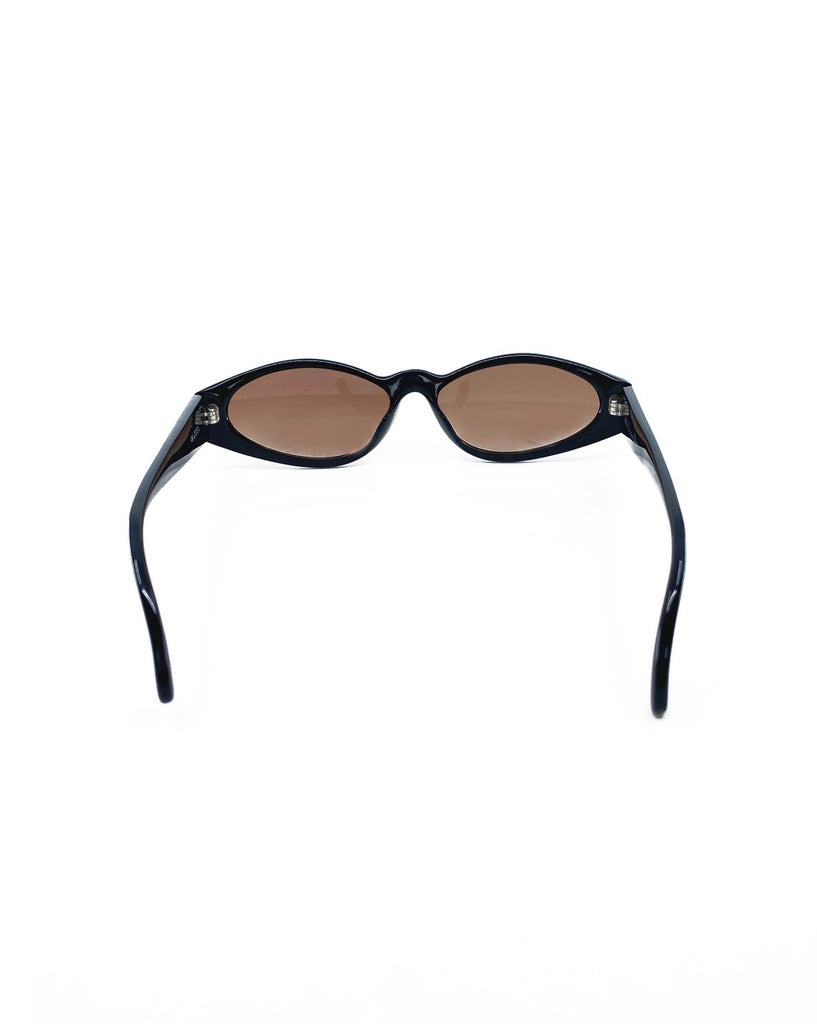 Fruit Vintage Christian Dior sunglasses dating to 1990. These small oval frames feature a gold trim over the nose and CD logo to each arm.