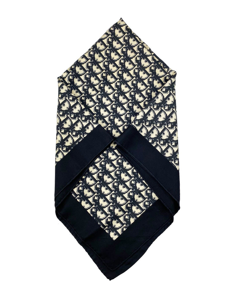 Fruit Vintage Christian Dior oblique print silk scarf in black and grey. Features a bold graphic Dior logo print and hand finished rolled hem edging.