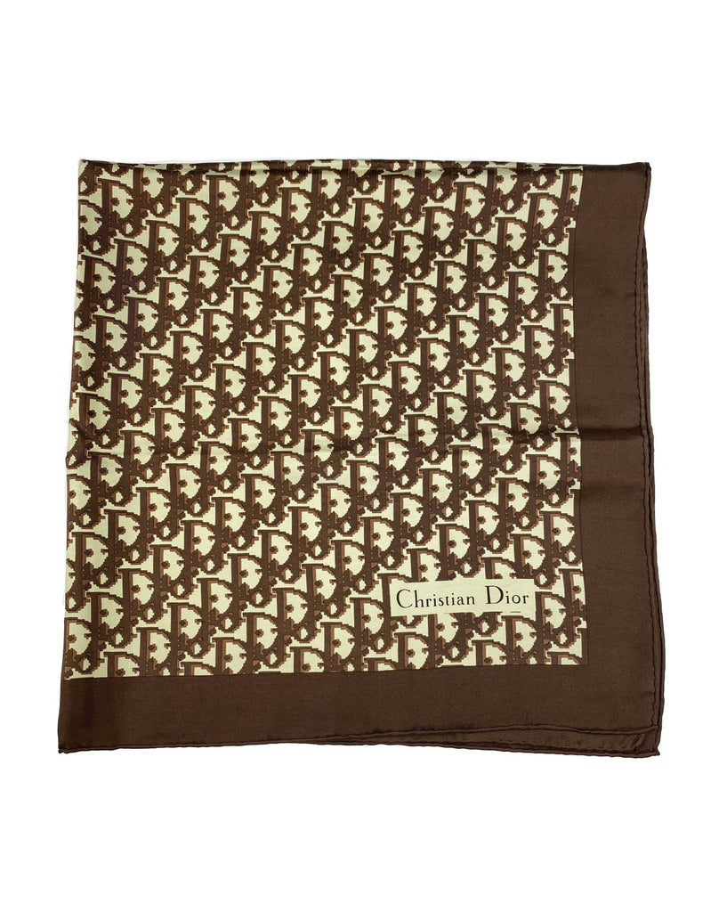 Fruit Vintage Christian Dior oblique print silk scarf in brown. Features a bold graphic Dior logo print and hand finished rolled hem edging.