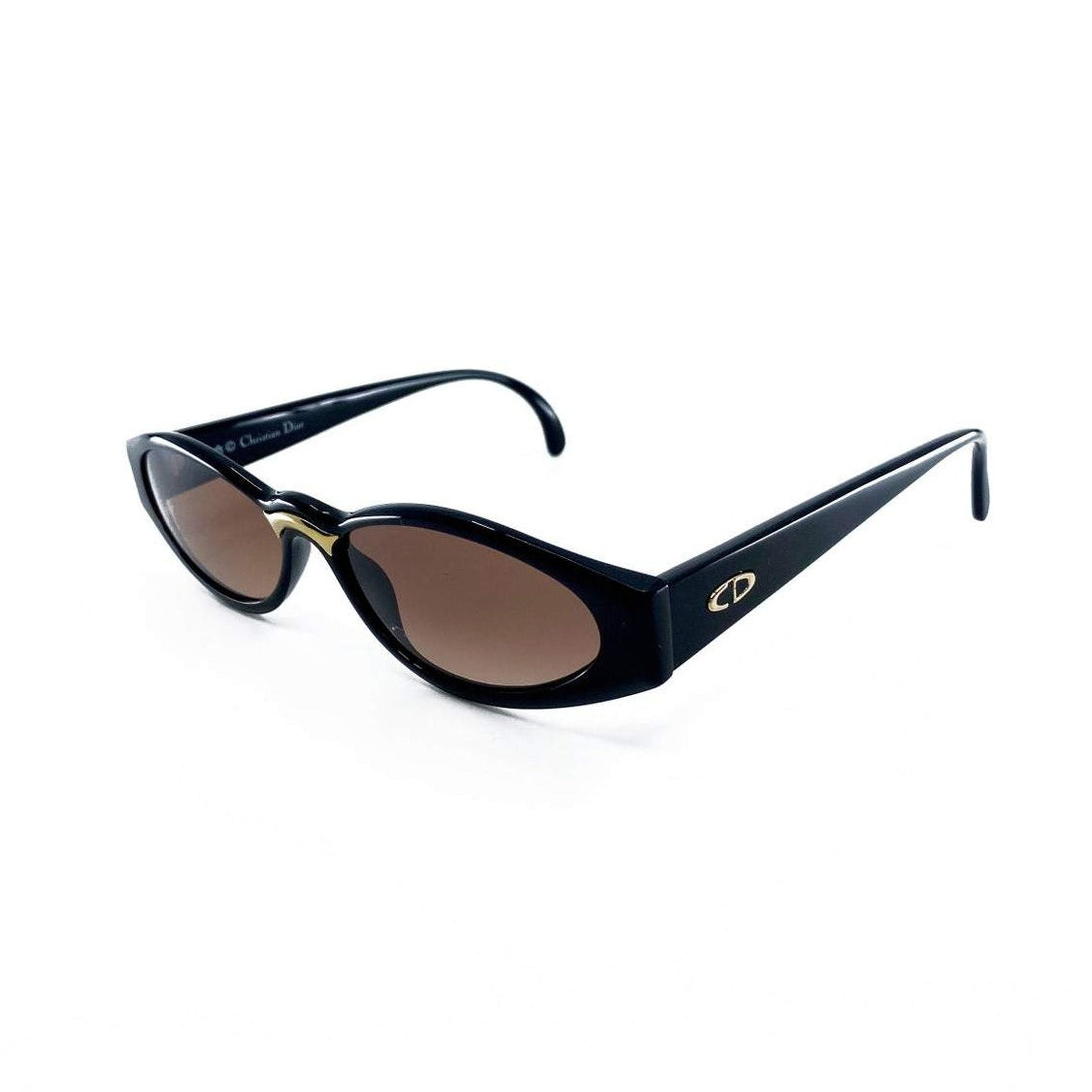 Fruit Vintage Christian Dior sunglasses dating to 1990. These small oval frames feature a gold trim over the nose and CD logo to each arm.
