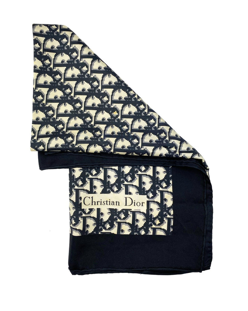 Fruit Vintage Christian Dior oblique print silk scarf in black and grey. Features a bold graphic Dior logo print and hand finished rolled hem edging.