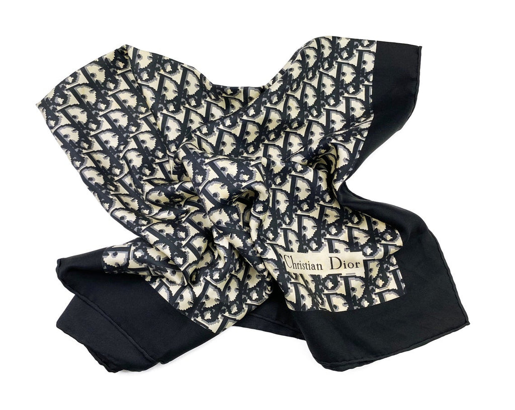 Fruit Vintage Christian Dior oblique print silk scarf in black and grey. Features a bold graphic Dior logo print and hand finished rolled hem edging.
