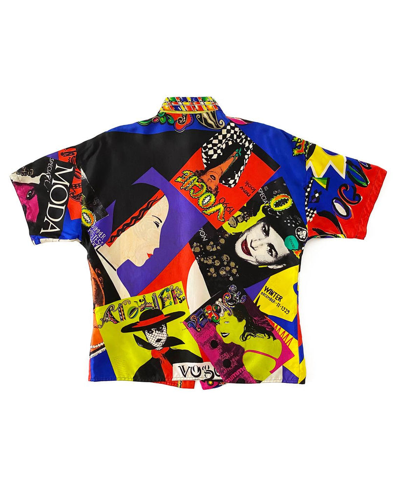 FRUIT Vintage Gianni Versace Vogue print silk short sleeve shirt from the Spring 1991 collection (as worn by Christy Turlington on the Runway). It features the iconic Vogue print in large scale all over and gold feature button on collar.