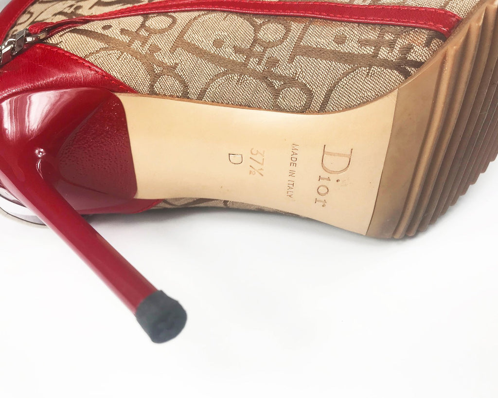 Fruit Vintage Christian Dior Rasta ankle boots, trotter monogram logo booties. Designed by John Galliano, they feature oblique logo print, lace up closure with leather laces, red leather trim and a large silver logo plate at rear.
