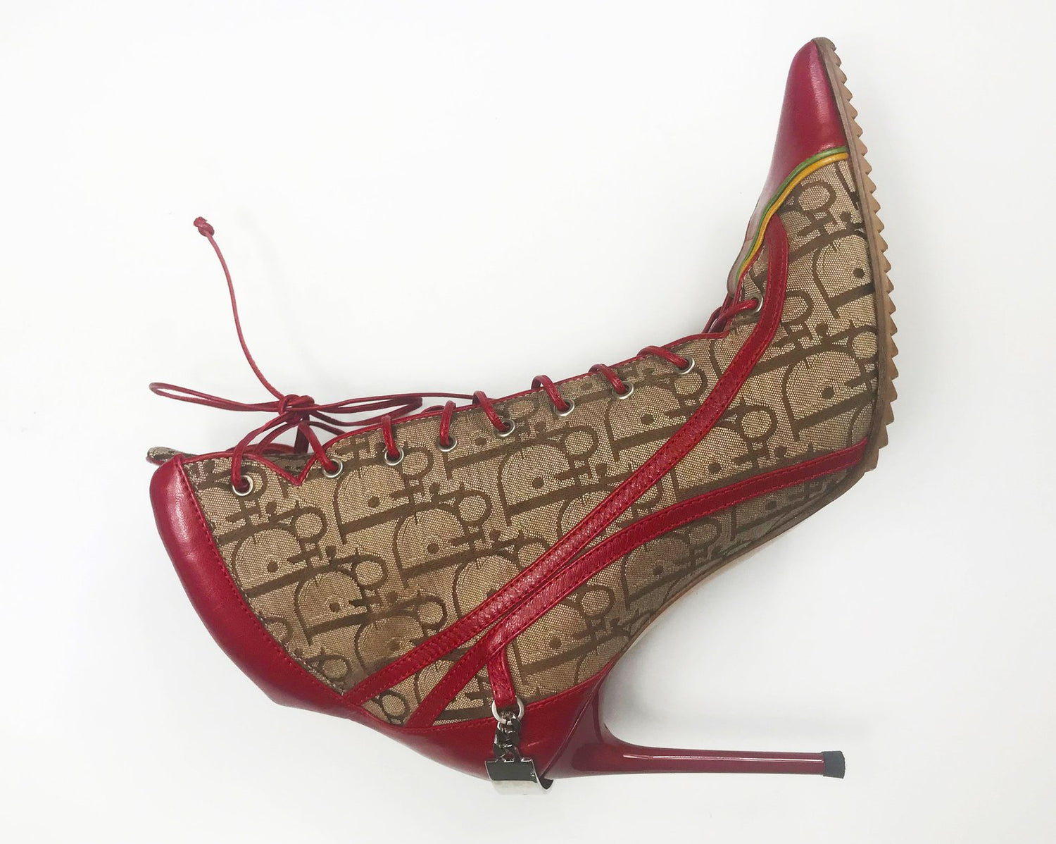 Fruit Vintage Christian Dior Rasta ankle boots, trotter monogram logo booties. Designed by John Galliano, they feature oblique logo print, lace up closure with leather laces, red leather trim and a large silver logo plate at rear.