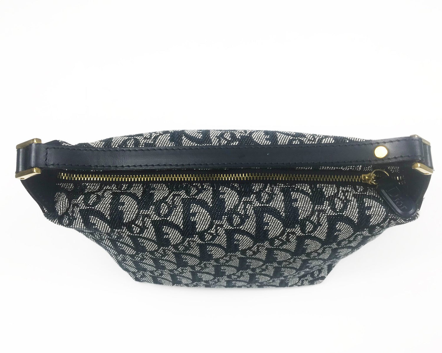 FRUIT vintage Christian Dior trotter logo mini purse in the iconic navy oblique monogram canvas. Features a small handle, logo zipper pull, gold hardware and navy leather trim.