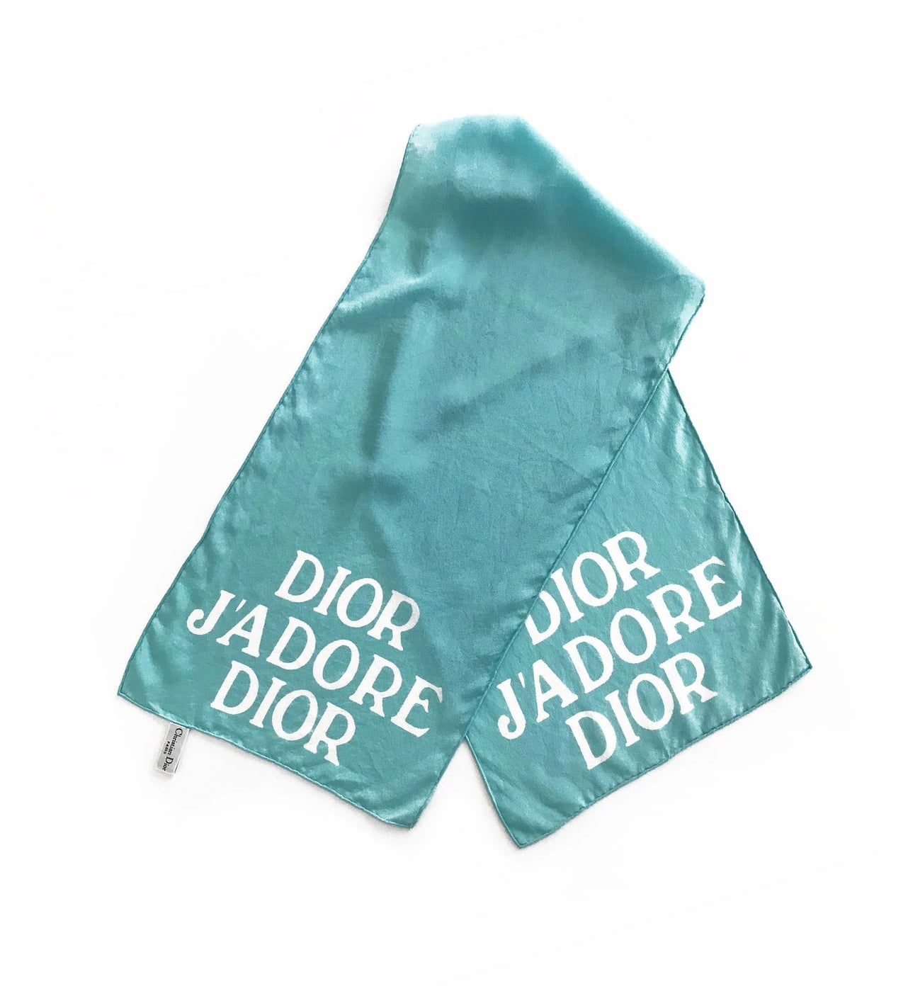 FRUIT vintage Christian Dior rare J'adore Dior logo monogram silk scarf perfect for use as a hair accessory, to tie around a hat or when worn around the neck. Features a bold graphic Dior logo print on both ends and hand finished rolled hem edging