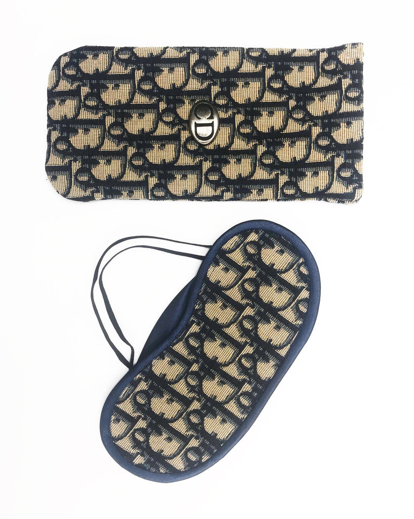 FRUIT vintage Christian Dior navy monogram logo eye mask and case set in mint/unused condition, dating to the 1980s. Features the classic Christian Dior trotter/oblique print all over and satin trim.