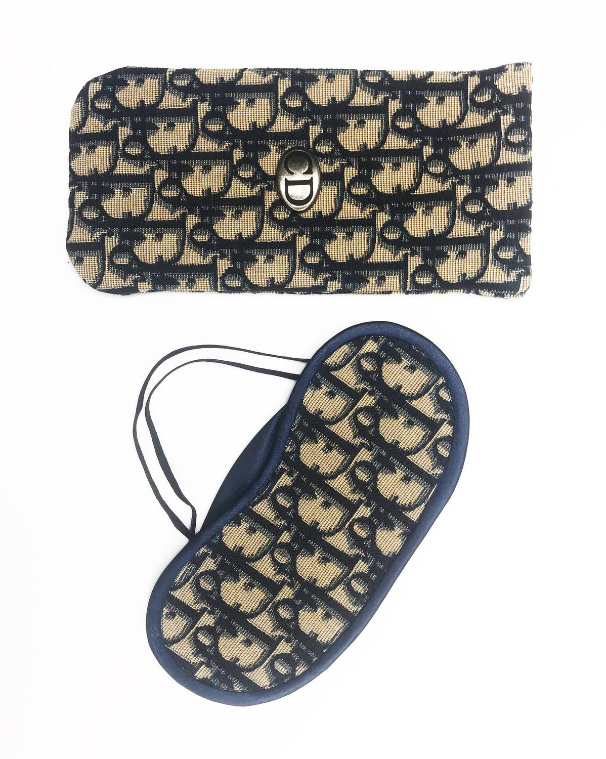 FRUIT vintage Christian Dior navy monogram logo eye mask and case set in mint/unused condition, dating to the 1980s. Features the classic Christian Dior trotter/oblique print all over and satin trim.