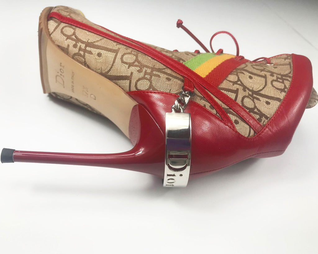 Fruit Vintage Christian Dior Rasta ankle boots, trotter monogram logo booties. Designed by John Galliano, they feature oblique logo print, lace up closure with leather laces, red leather trim and a large silver logo plate at rear.