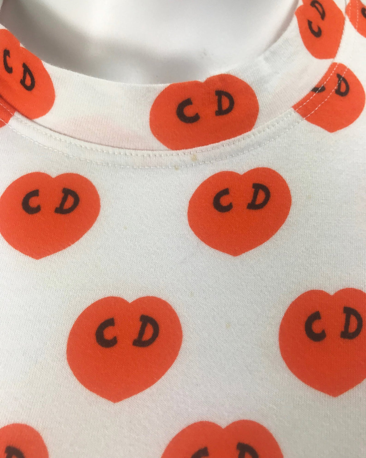 Fruit Vintage Christian Dior CD heart print Logo t-shirt by John Galliano. Features a classic t-shirt cut and graphic pattern logo monogram print.