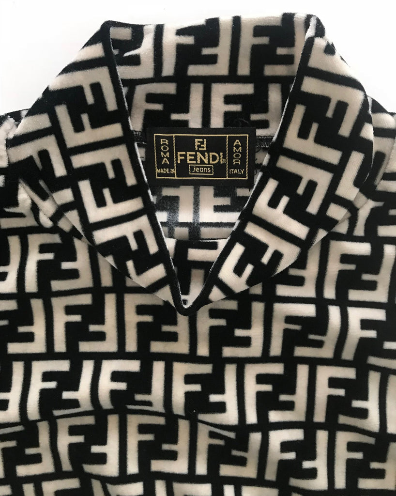 FRUIT vintage Fendi 90s Zucca Logo Monogram Print turtleneck sweater made from stretch velvet fabric. Features a classic turtleneck cut and bold Fendi logo print in black and beige as seen on Sofia Richie.