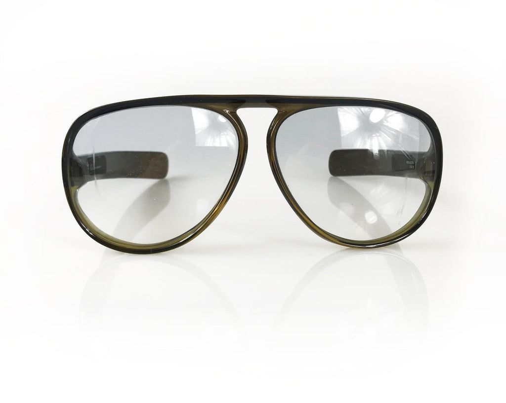 Fruit Vintage Christian Dior oversized 1970s aviator sunglasses. These are a rare and collectible style, they feature Dior CD logos on each arm, a smokey brown translucent frame and grey gradient lenses.