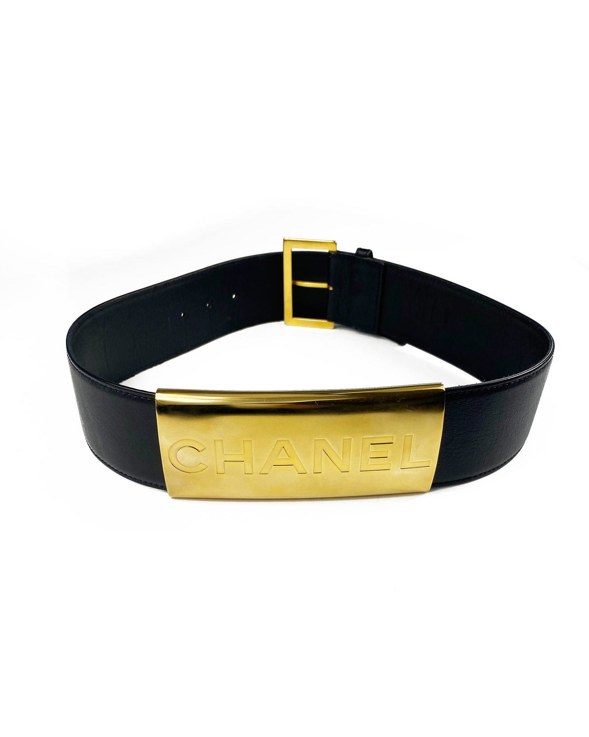 Fruit Vintage Chanel Logo Waist Belt dating to 1997. It features a very large gold bar with CHANEL logo at the front, internal logo foil stamp and date, and gold buckle at rear.